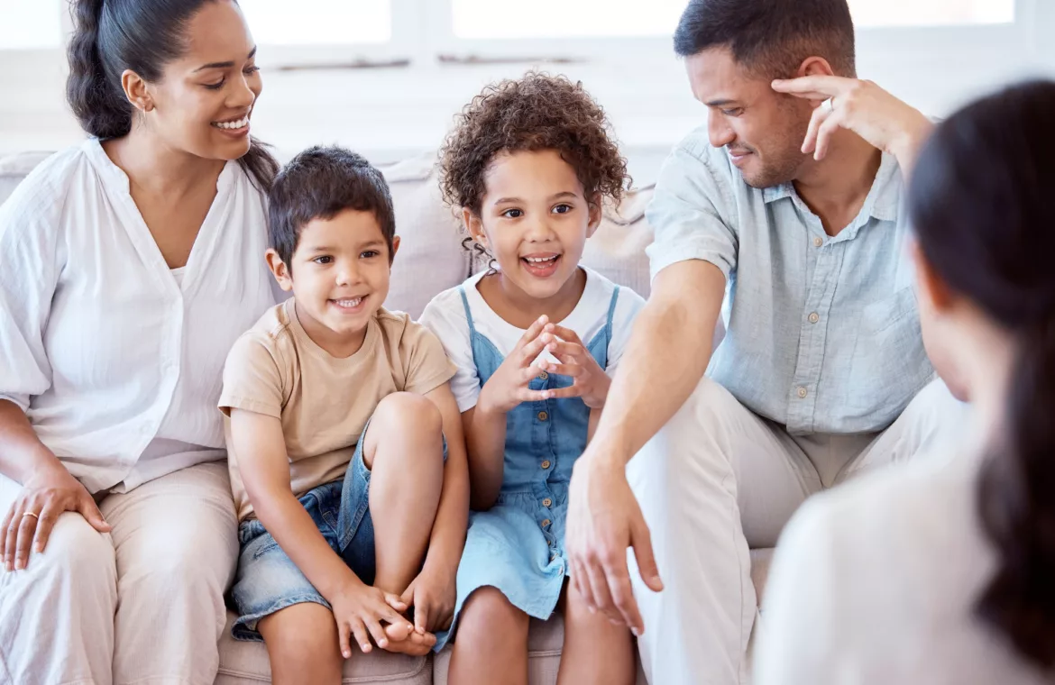 All families can benefit from therapy. Shot of a family meeting with a therapist.